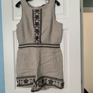 Linen romper with decorative finish